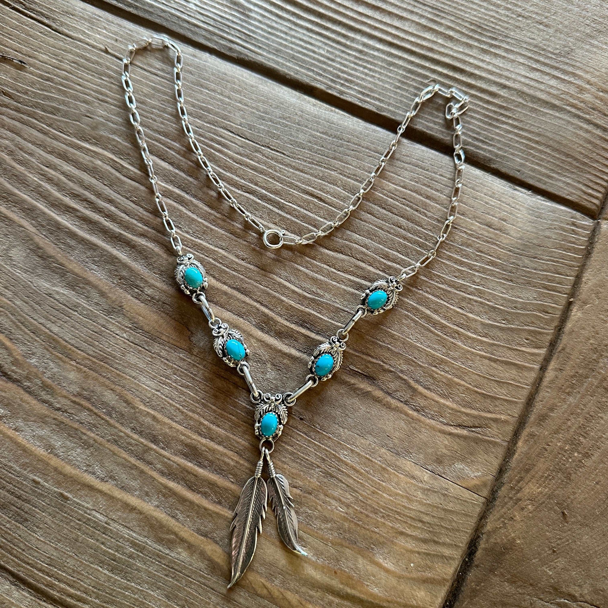 Navajo Sterling Silver Necklace with Turquoise Stones and Feather Pendant Detail - High Voltage Ranch