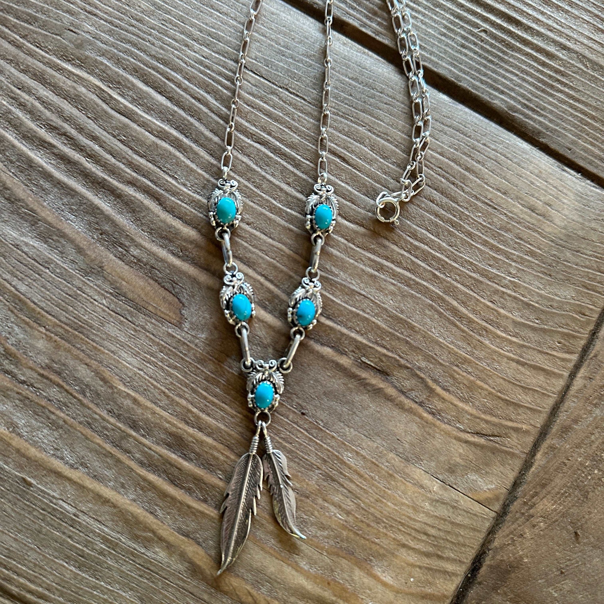 Navajo Sterling Silver Necklace with Turquoise Stones and Feather Pendant Detail - High Voltage Ranch