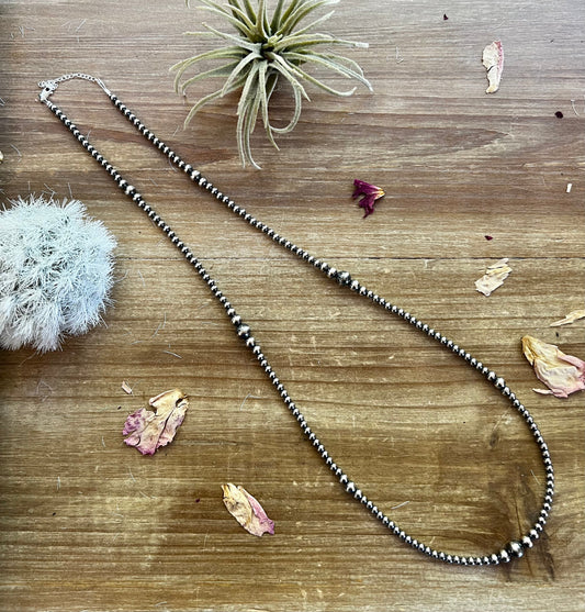 Graduated Sterling Silver Pearl Necklace - 28”